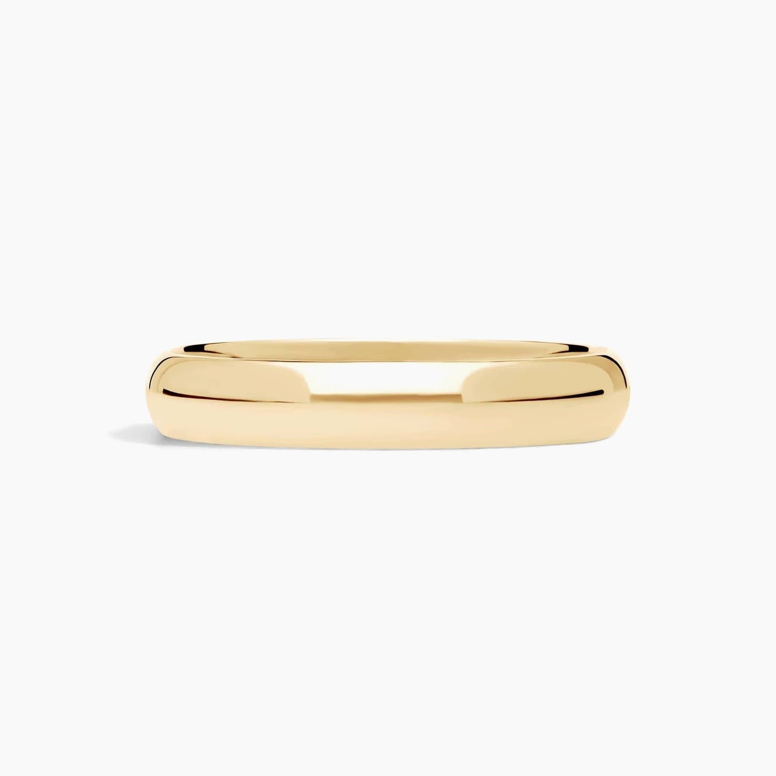 Classic polished wedding band, 4 mm wide, in 14K yellow gold