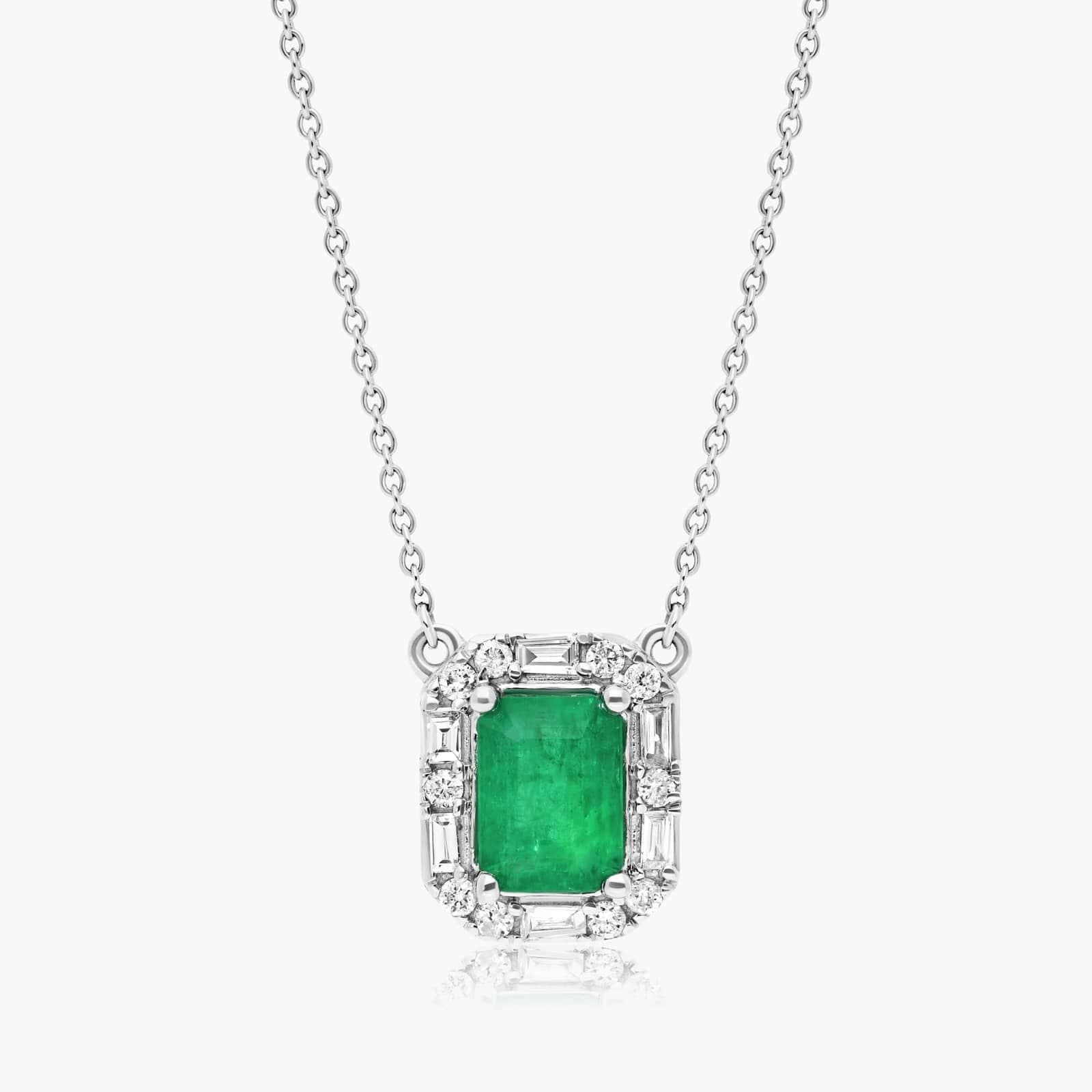 Emerald and diamond halo pendant in 14K white gold