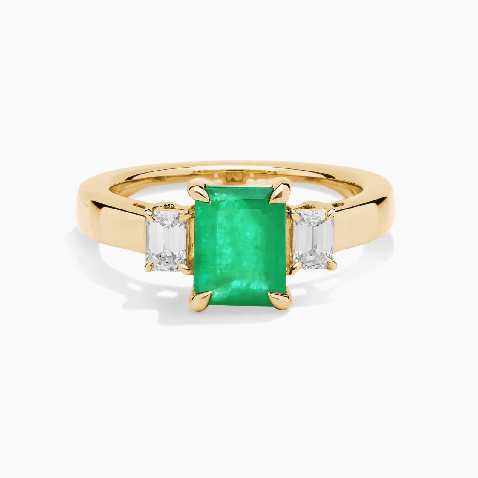 Emerald cut emerald and diamond ring in 14K yellow gold