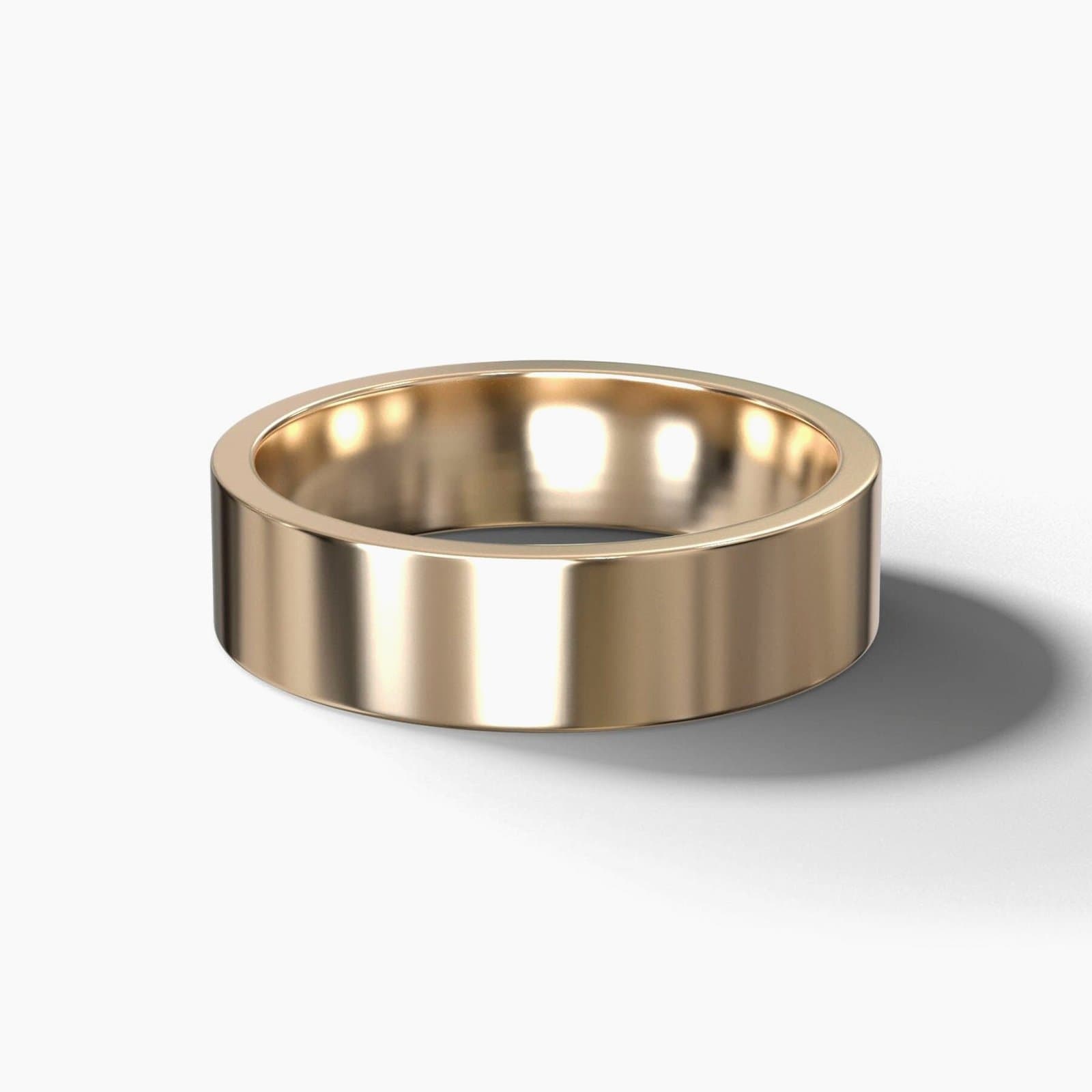 Flat cigar wedding band, 5 mm wide, in yellow gold