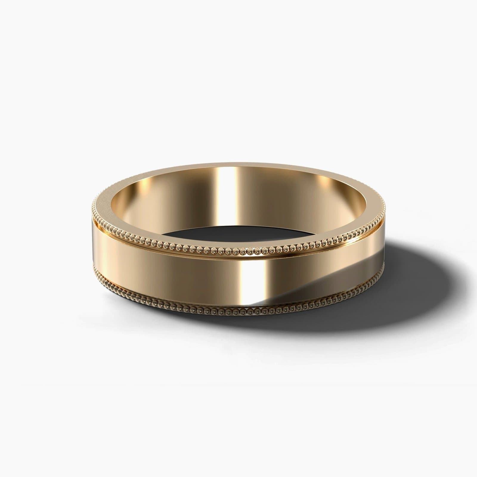 Flat milgrain wedding band, 5 mm wide, in yellow gold