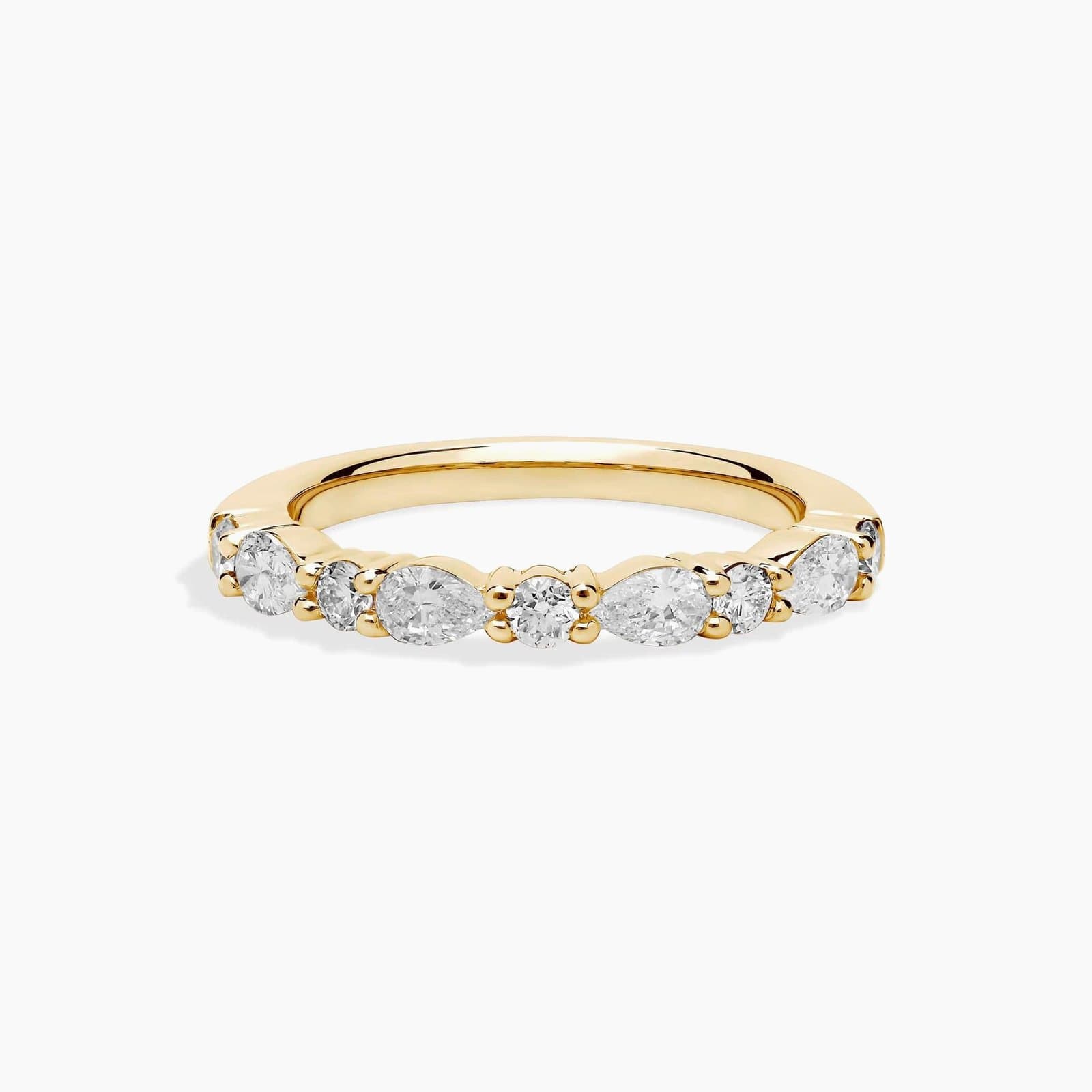 Pear and round diamond band in 14K yellow gold