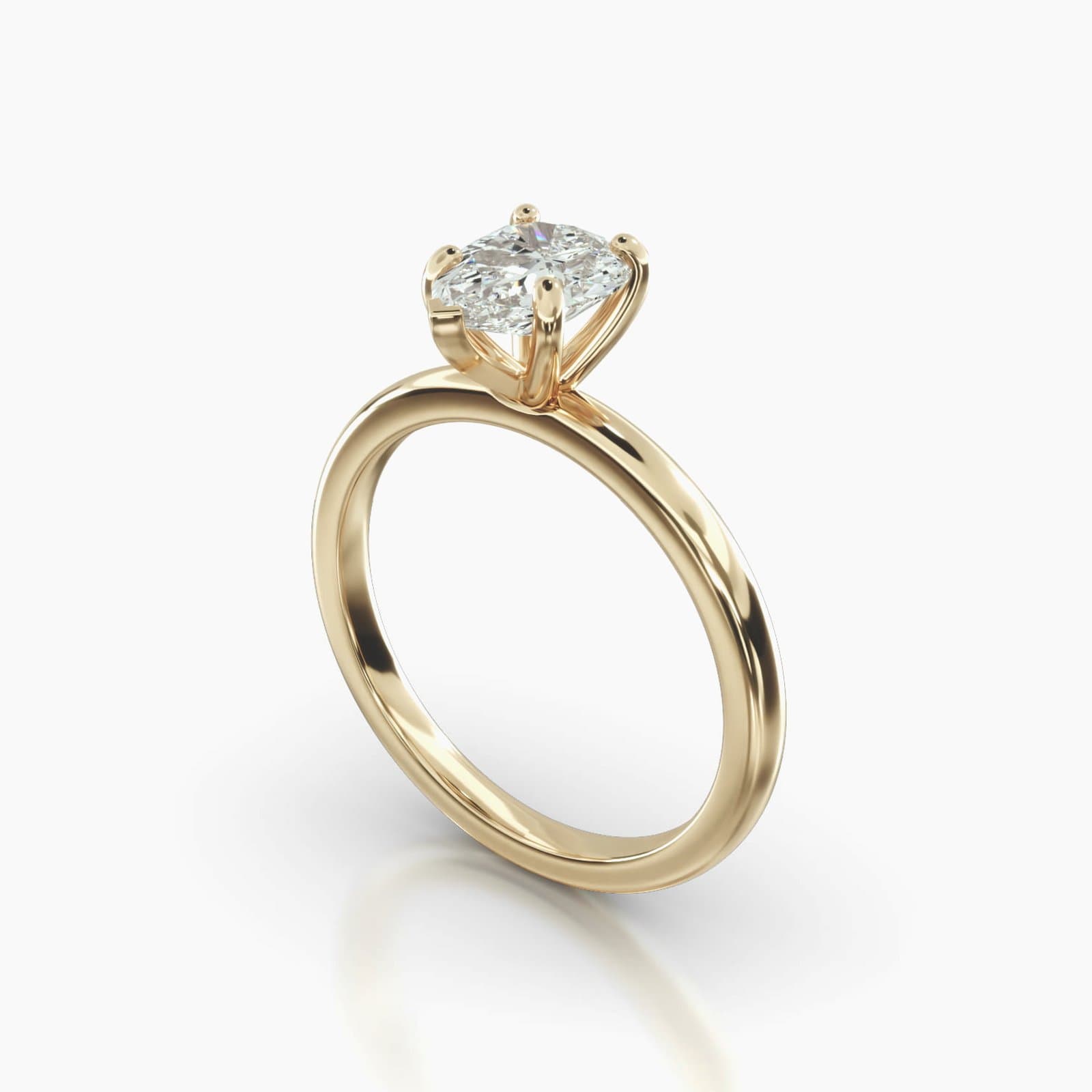 Pear Shaped Petite Solitaire Engagement Ring in yellow gold
