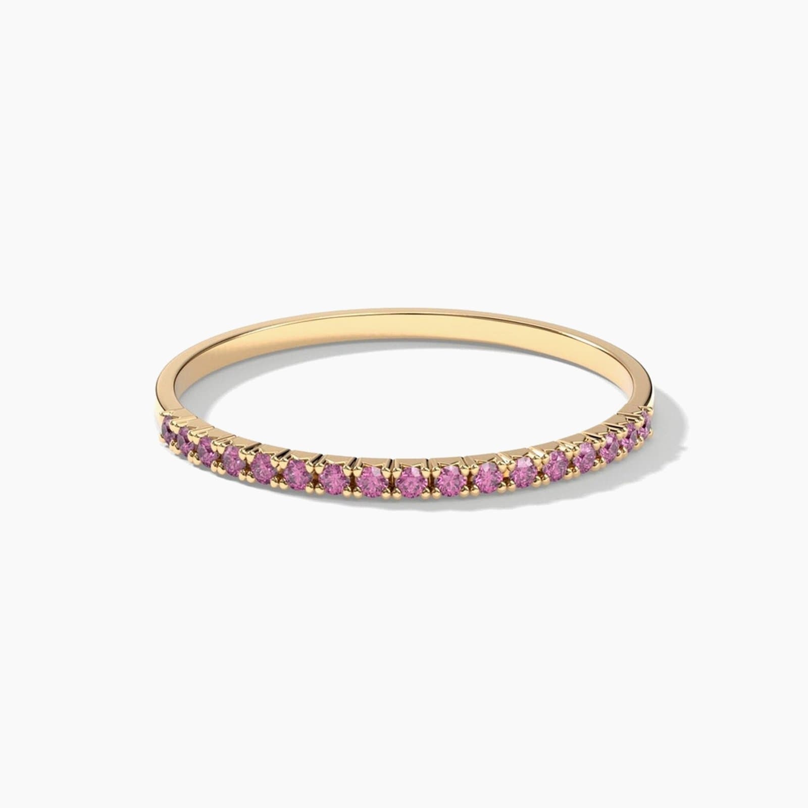 Petite French pavé pink sapphire band in yellow gold