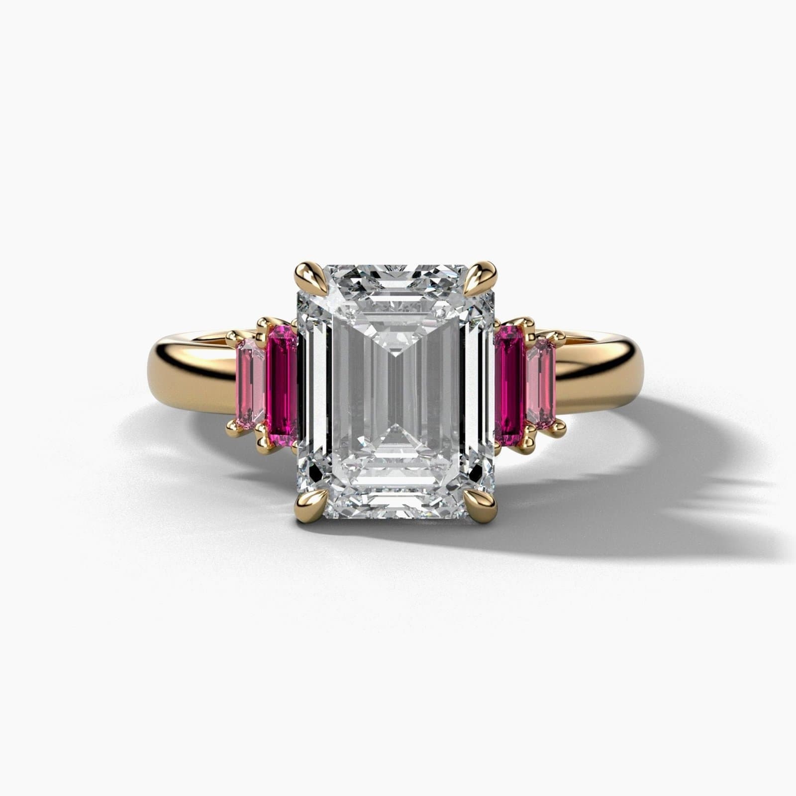 Ruby and pink sapphire five stone engagement ring in yellow gold